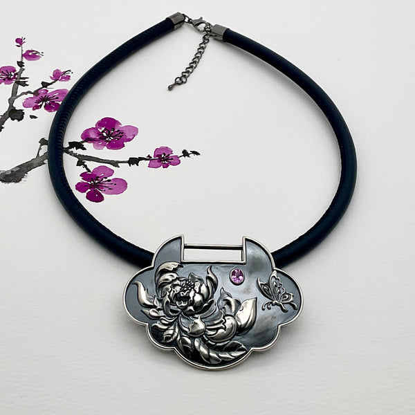 Oriental Chrysanthemum Silver Lock Necklace with Oval Pink Sapphire